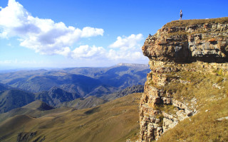 Cliff overlook valley mountains blue - sense of awe free wallpaper
