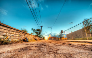Dirt road fence building sky - ashcan school free wallpaper