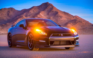 Black car desert mountains sunset - the desert free wallpaper