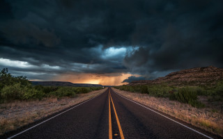 Stormy road clouds yellow line - stormy weather free wallpaper
