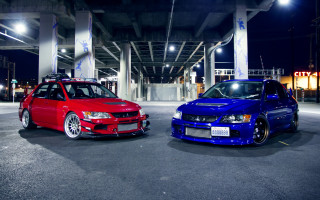 Two cars parking lot night 2 - a parking lot free wallpaper