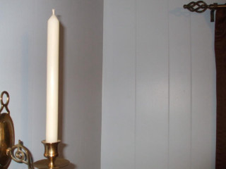 Candle lit wall mirror sconce - a wall next free wallpaper