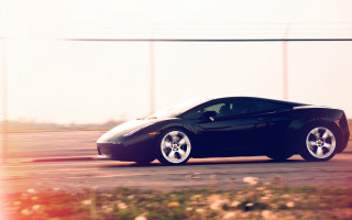 Black sports car road fence 3 - a road next free wallpaper
