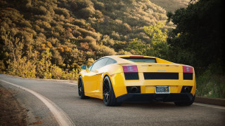 Yellow sports car mountains california 2 - a yellow sports car free wallpaper