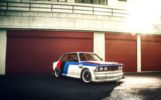Car garage red white blue - a garage door free wallpaper