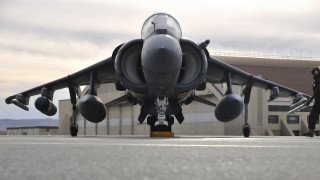 Fighter jet airport man intimidating - top of an airport tarmac next free wallpaper