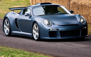 Blue sports car driving road 5 - a blue sports car free wallpaper for desktop