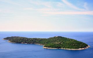 Small island plane boat horizon - a small island in the middle of the ocean free wallpaper