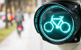 Traffic light bicycle viennese actionism - a street corner free wallpaper