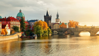 River bridge buildings boats sunset - warm color free wallpaper