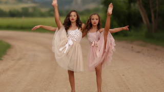 Two girls dresses dirt road - one girl free wallpaper