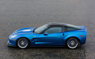Blue sports car brick road - a black top free wallpaper