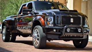Black truck red interior brick - a building and trees free wallpaper