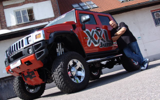 Man red truck monster tire - a monster truck free wallpaper