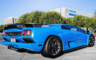 Blue sports car parking lot 9 - a parking meter free wallpaper