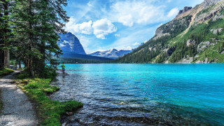 Man lake mountains clouds nature - naturalism free wallpaper