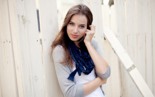 Woman fence cellphone scarf portrait - a scarf free wallpaper