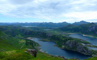 Lake mountains cloudy sky grassy 2 - a view of a lake free wallpaper