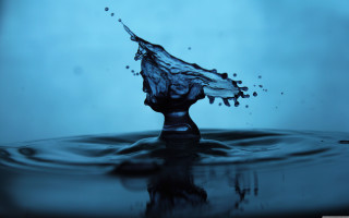 Water droplet blue background splashing - this image free wallpaper