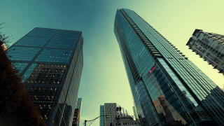 Tall buildings city street corner - a couple free wallpaper