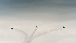 Airplanes cloudy sky smoke trailing - behind them free wallpaper