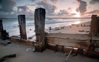 Wooden fence beach sunset waves 2 - the water behind free wallpaper