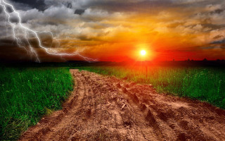 Dirt road field lightning stormy - a field of grass and dirt free wallpaper
