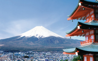 Tall building mountain blue sky 2 - mountain in the distance free wallpaper