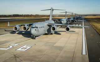 Military planes runway sky clouds - an airport free wallpaper