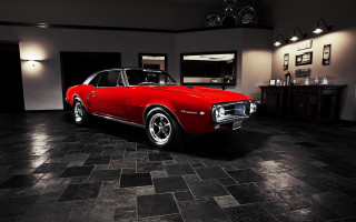 Red car parked black tile - floor free wallpaper