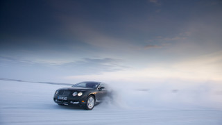 Black car driving snowfield cloudy - a sky background free wallpaper for desktop