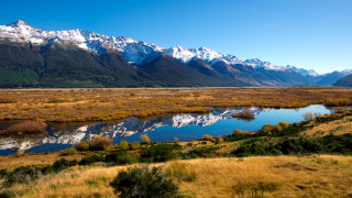 Lush green river mountains sky - beautiful landscape free wallpaper