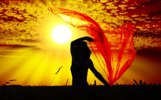 Woman sunset red scarf backlighting - a sunset free wallpaper