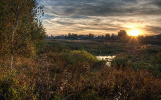 Sunset river trees grass cloudy - a sunset over a river free wallpaper