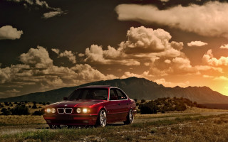 Red car mountain sunset clouds - fine art free wallpaper