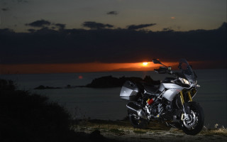 Motorcycle hill ocean sunset clouds - dosso dossi free wallpaper for desktop