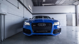 Blue car garage white bricks - a blue car free wallpaper
