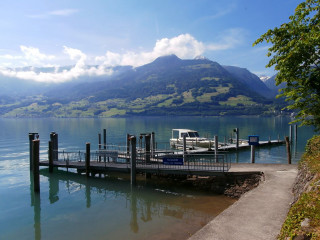 Lake mountains boat pier sky - a pier free wallpaper