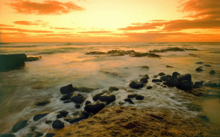 Sunset ocean rocks water cloudy 3 - rock and water free wallpaper