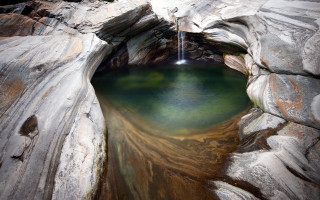 Small waterfall cave mountainside naturalism - a small waterfall free wallpaper