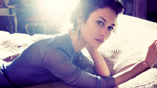 Woman bed serious look naturalist - naturalism free wallpaper