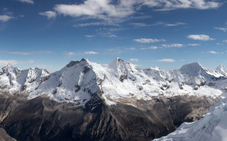 Snowy mountains blue sky clouds 3 - a mountain range free wallpaper