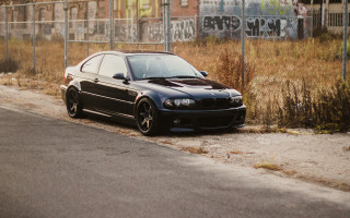 Black car fence field military - the side of a road next free wallpaper