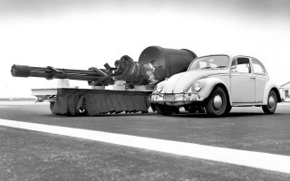 Car towing military gun trailer - beeple free wallpaper