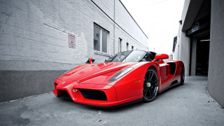 Red sports car street corner 2 - a black roof free wallpaper