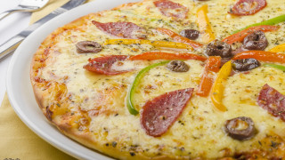 Pizza pepperoni peppers olives plate - a fork and knife next free wallpaper