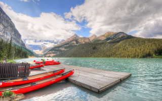 Dock red canoes lake mountains - anthony s waters free wallpaper
