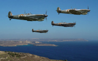 Four planes flying over water - vfx free wallpaper