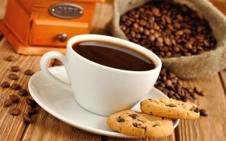 Coffee cookies saucer wooden table - a saucer free wallpaper