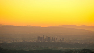 City skyline mountains dusk hazy - elbridge ayer burbank free wallpaper
